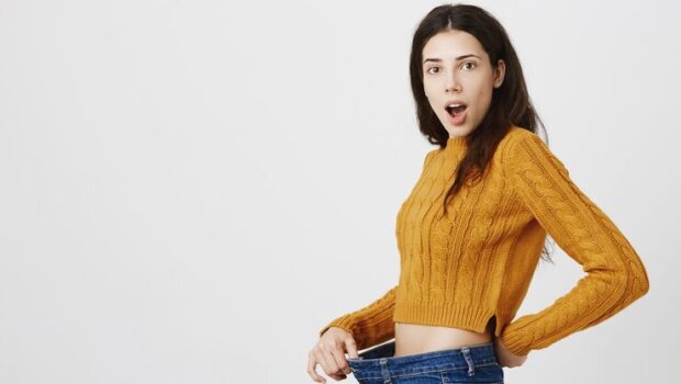 cheerful-girl-lost-weight-rejoicing-diet-workout-worked_176420-25830
